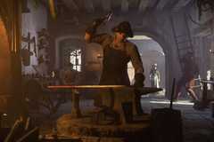 Henry hammering a longsword in a forge while activity bustles behind him.